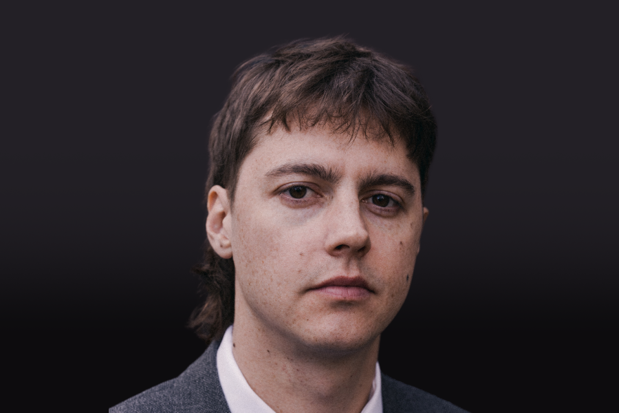 Karl Hirzer, conductor, performing with the Regina Symphony Orchestra